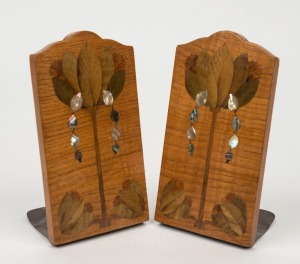 A pair of French marquetry bookends with mother of pearl embellishments, circa 1900, 16.5cm high