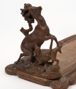 An antique Black Forest adjustable bookstand with hunting scene ends, 19th century, ​​​​​​​16cm high, 34cm wide when closed - 2