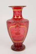 An antique Bohemian ruby glass vase with wheel cut animal scene vignettes, 19th century, ​​​​​​​25cm high - 2