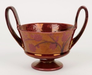 MOORCROFT ruby lustre glazed two handled bowl, incised "W. Moorcroft", 14cm high, 18.5cm wide
