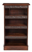 An Australian kauri pine set of open bookshelves with chip-carved paterae fascias and a plinth base, circa 1910, ​​​​​​​114.5cm high, 61cm wide, 26cm deep