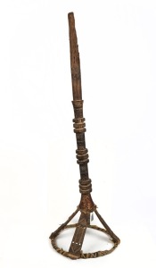 A calabash stand, carved wood fabric and fibre, North African origin, 90cm high