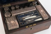 An impressive antique rosewood travel box fitted with lift-out tray housing sterling silver jars and manicure set, in original leather outer case, made in London, circa 1823, 16cm high, 31cm wide, 23cm deep overall - 5