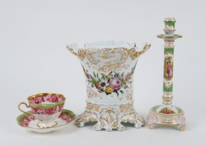 A German porcelain candlestick with green and gilt decoration, a Crescent rose pattern cup and saucer, and an English Dresden style oval vase with floral gilt decoration, 19th and 20th century, (3 items), the candlestick 27cm high.