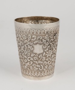 An antique Indian silver beaker, 19th century, base crudely engraved with later presentation inscription, 9.5cm high, 151 grams