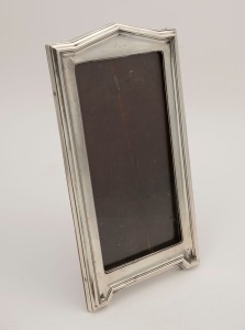 A sterling silver table picture frame by Deakin & Francis of Birmingham, circa 1913, 25cm high