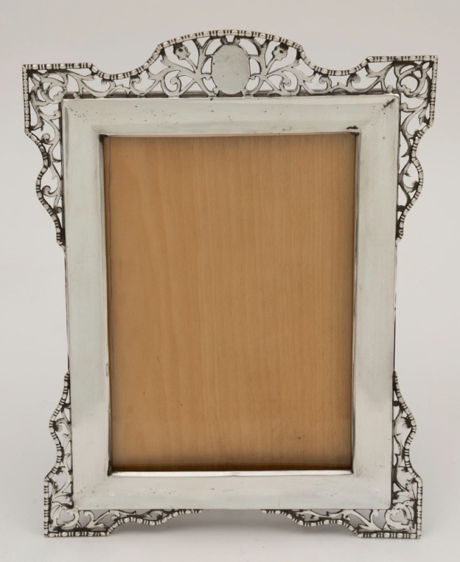 A sterling silver table picture frame, made in Birmingham, circa 1913, ​​​​​​​20cm high