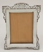 A sterling silver table picture frame, made in Birmingham, circa 1913, ​​​​​​​20cm high