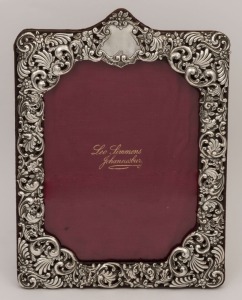 An English pierced sterling silver picture frame by H. Matthews of Birmingham, circa 1902, 28cm high