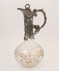 An antique English claret jug with silver plated mounts and acid etched cameo butterfly and floral decoration with remains of gilded highlights, 19th century, 31cm high