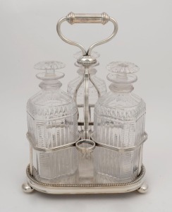 A Georgian Sheffield plated three bottle decanter stand with original decanters, early 19th century, 28cm high