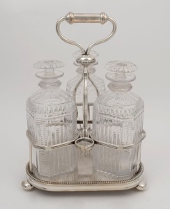 A Georgian Sheffield plated three bottle decanter stand with original decanters, early 19th century, ​​​​​​​28cm high