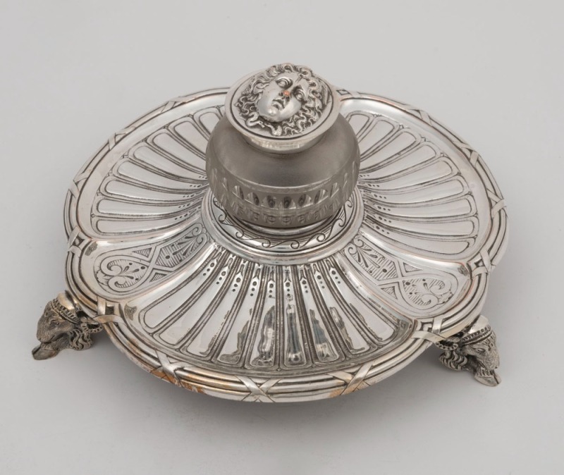 An antique French silver plated inkwell adorned with goats, 19th century,11cm high, 20cm wide