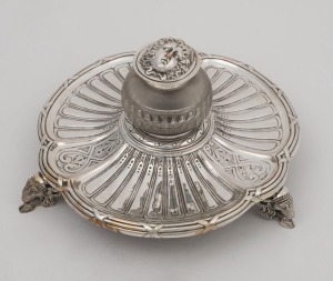 An antique French silver plated inkwell adorned with goats, 19th century,11cm high, 20cm wide