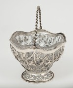 A Georgian sterling silver and cut crystal bon bon dish with swing handle, made in London, circa 1771, 14.5cm high - 2