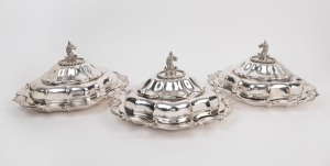 A stunning set of three Georgian Sheffield plated tureens with sterling silver griffin head finials, early 19th century, 17cm high, 35cm wide each