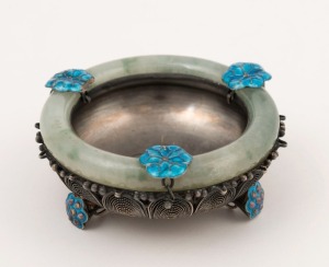 A Chinese filigree silver bowl with jade top and blue enamel lotus leaf decoration, early 20th century, stamped "SILVER", 8cm wide