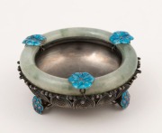 A Chinese filigree silver bowl with jade top and blue enamel lotus leaf decoration, early 20th century, stamped "SILVER", 8cm wide