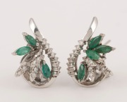 A pair of 14ct white gold earrings, set with diamonds and emerald, 2.5cm high, 8.5 grams total