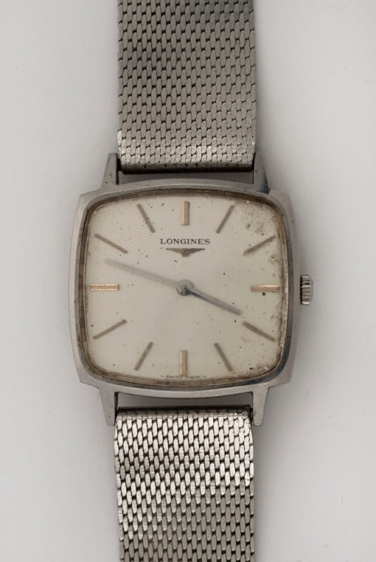 LONGINES manual wristwatch in square stainless steel case with silver dial, baton numerals and stainless steel mesh band, circa 1960. 3.1cm wide including crown