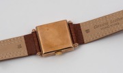 CYPRUS manual wristwatch in square solid 9ct gold case, silver dial, subsidiary second hand, Arabic numerals and brown leather band, circa 1960. 2.7cm wide including crown - 3