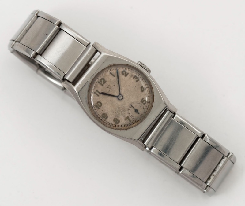 OMEGA manual wristwatch in stainless steel case, subsidiary second hand,and stainless steel expandable band, circa 1940. 2.5cm wide including crown