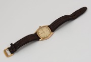 OMEGA "SEAMASTER" wristwatch in rolled gold and stainless steel case with gold dial, date window, baton numerals and brown leather band, circa 1970. 3.8cm wide including crown - 2