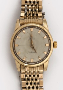 OMEGA "SEAMASTER" automatic wristwatch in rolled gold and stainless steel case with baton numerals and original gold plated Omega band, circa 1960. 3.7cm wide including crown