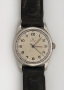 OMEGA manual wristwatch in stainless steel case with silver dial, Arabic numerals and black leather band, circa 1950. 3.5cm wide including crown