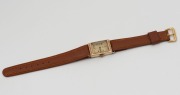 OMEGA manual wristwatch in rectangular rolled gold and stainless steel case with gold dial, subsidiary second hand, circa 1940. 2.2cm wide including crown - 2