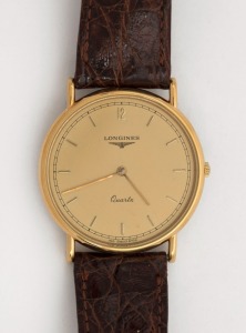LONGINES wristwatch in rolled gold and stainless steel case with gold dial, circa 2000, with original brown leather band. Housed in original box with papers, 3.5cm wide including crown