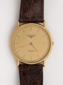 LONGINES wristwatch in rolled gold and stainless steel case with gold dial, circa 2000, with original brown leather band. Housed in original box with papers, 3.5cm wide including crown