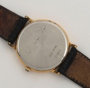 LONGINES wristwatch in rolled gold and stainless steel case with white dial, date window, Roman numerals, circa 1990, original black leather band. Housed in original box, 3.5 cm wide including crown - 3