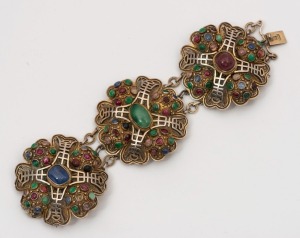 An antique Chinese gilded filigree silver bracelet adorned with numerous semiprecious cabochon stones, 19th/20th century, stamped "SILVER", ​​​​​​​19cm long, 5.5cm wide, 105 grams total
