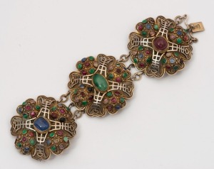 An antique Chinese gilded filigree silver bracelet adorned with numerous semiprecious cabochon stones, 19th/20th century, stamped "SILVER", 19cm long, 5.5cm wide, 105 grams total