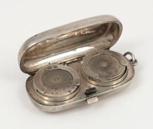 An antique sterling silver double sovereign case, made in Birmingham, circa 1894, 6cm wide overall