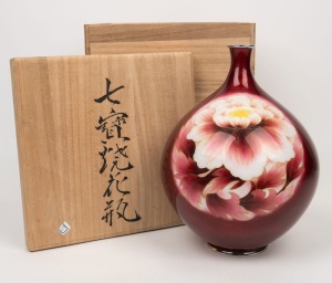 A Japanese pigeon blood cloisonne vase with floral decoration, in original timber box, 20th century, 26cm high