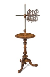 An antique English walnut music stand, 138cm high