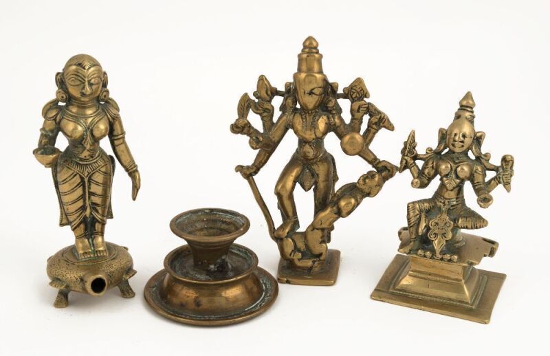 Four assorted religious artefacts, cast brass and bronze, North Indian and Tibetan, 18th/19th century, the largest 12.5cm high