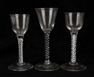 Three Georgian air twist glasses, 18th century, the largest 15.5cm high