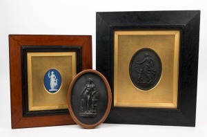 WEDGWOOD group of three antique oval porcelain plaques, two in basalt of Venus and Cupid, plus Adonis; the other of Diana in blue and white jasper ware, 19th/20th century, the largest 43 x 38cm overall