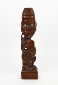 Maori warrior statue, carved wood and paua shell,20th century, 39cm high