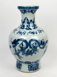 A Chinese blue and white porcelain vase decorated with boys playing, 20th century, six character mark to base, 38cm high