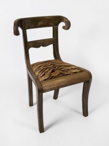 A Georgian style boudoir chair with ram's head decoration and copper and brass veneer, 20th century,  90cm high, 58cm wide