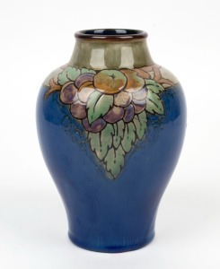 ROYAL DOULTON LAMBETH pottery vase with fruit motif on blue and celadon ground, early 20th century, impressed and black factory marks to base, 20.5cm high