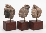 A group of three Gandharan terracotta heads of a Bodhisattva, circa 3rd century A.D., approximately 7cm high each (excluding stands) - 2