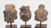 A group of three Gandharan terracotta heads of a Bodhisattva, circa 3rd century A.D., approximately 7cm high each (excluding stands) - 4