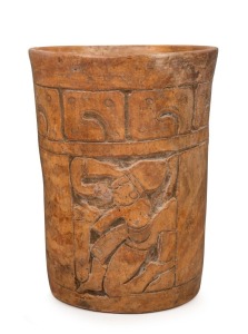 Pre-Columbian Mayan orange ware pottery cylinder vessel, the upper register of carving with bird glyphs and the lower register with a standing and a kneeling lord, late Classic Period, 550-950 A.D., 19cm high