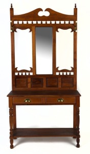 An Edwardian style hardwood hall stand with porcelain and brass hooks, late 20th century, 201cm high, 100cm wide, 34cm deep