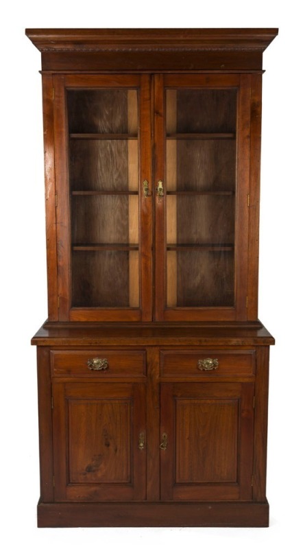 An antique walnut two door bookcase, late 19th century, ​​​​​​​217cm high, 108cm wide, 46cm deep